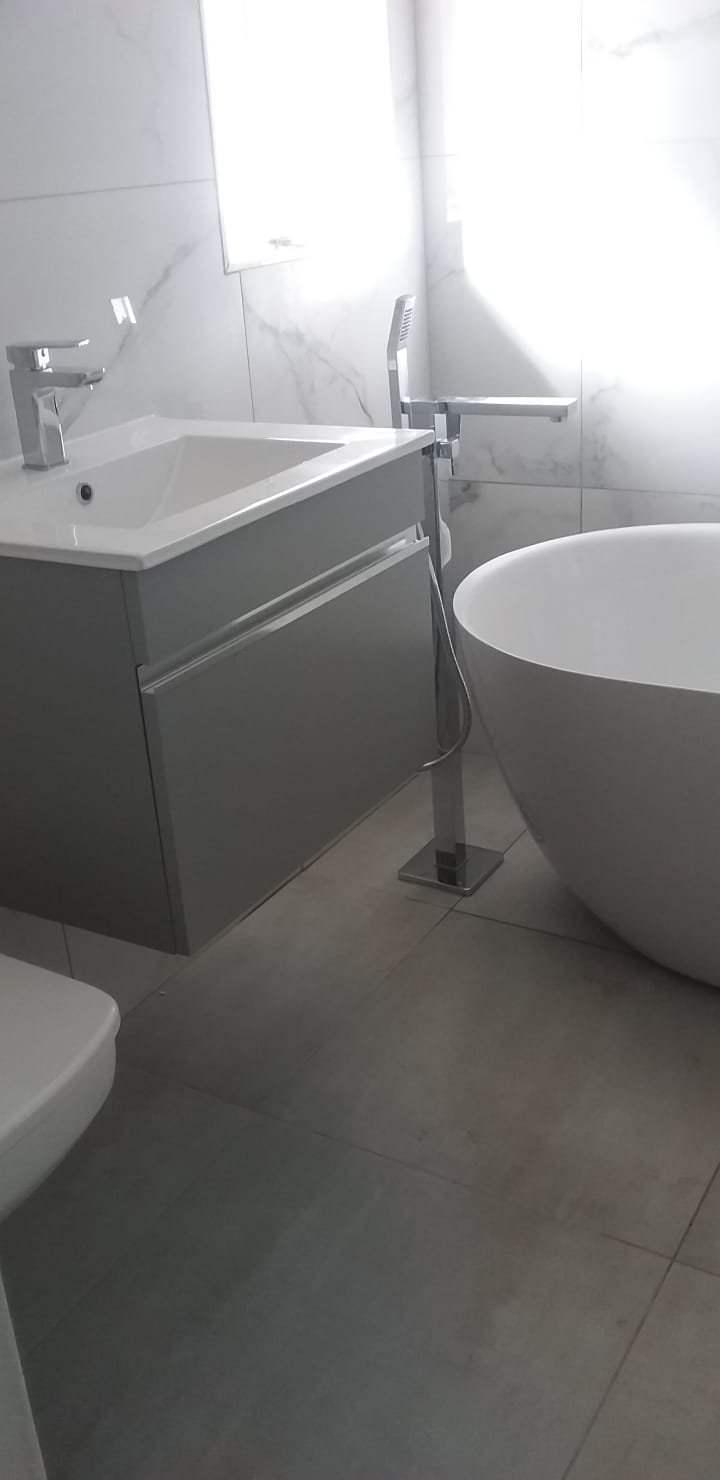 Modern bathroom with freestanding bath