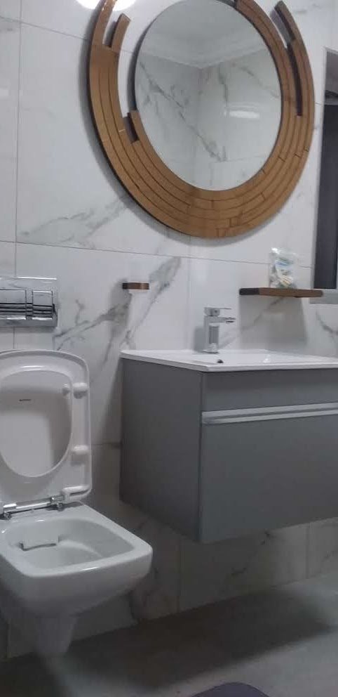 Vanity with round mirror
